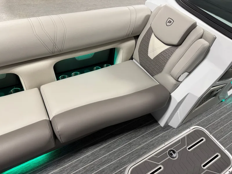 Slide: The Image of Luxurious seating with gray and cream upholstery, green lighting, and textured flooring. - 18