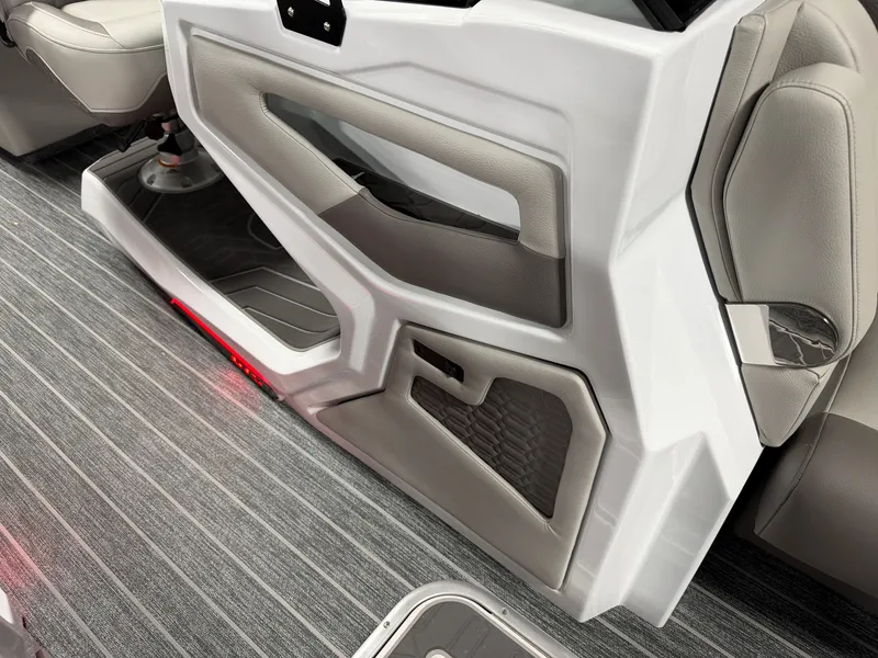 Slide: The Image of Interior view of a modern boat with gray upholstery and textured flooring. - 41