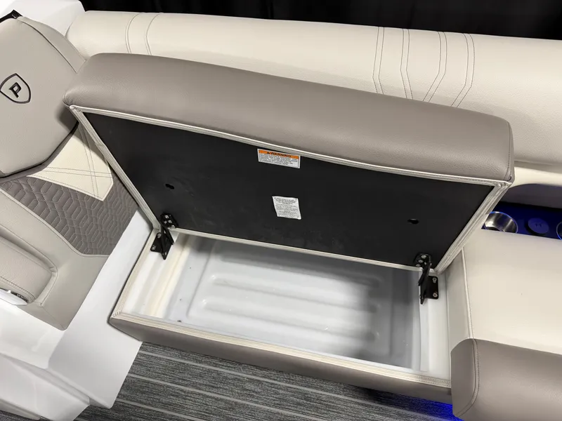 Slide: The Image of The Premier 250INTRIGUE 2027 features a seat with integrated storage. - 32