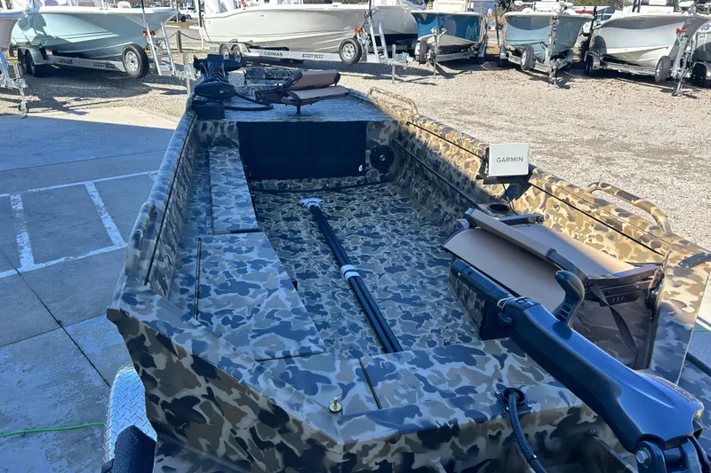 Slide: The Image of 2026 Excel 1751 Viper F4 boat with camouflage design, equipped with Garmin technology. - 7