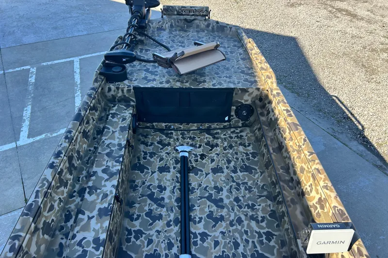 Slide: The Image of Camouflage-patterned 2026 Excel 1751 Viper F4 boat with Garmin equipment on deck. - 9