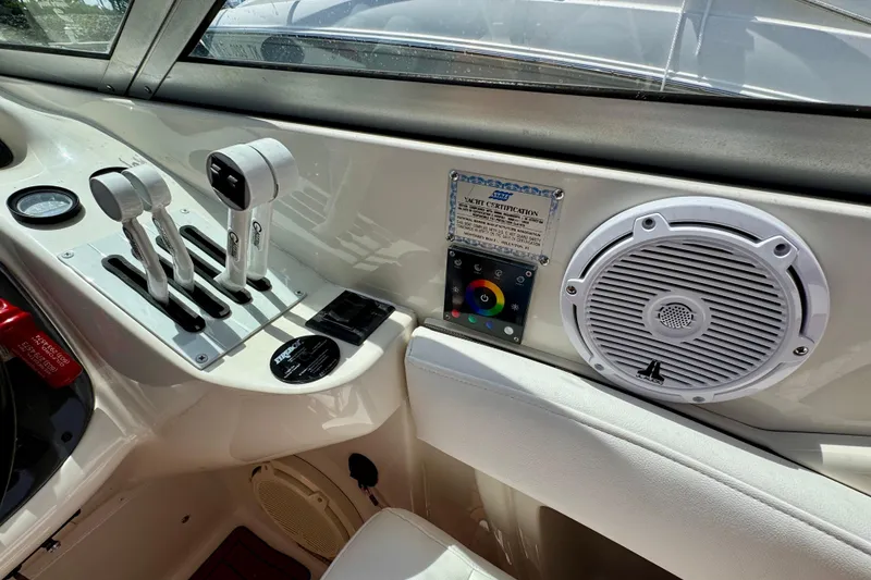 Slide: The Image of 2005 Monterey 298SS Super Sport boat controls and speaker system. - 16
