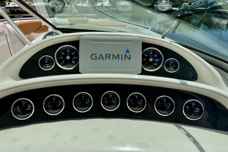 Slide: The Image of Dashboard of 2005 Monterey 298SS Super Sport boat with Garmin navigation system. - 17