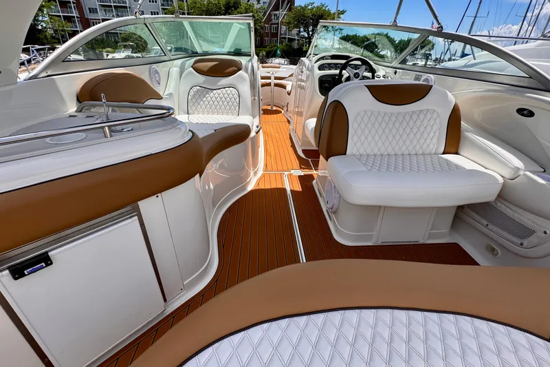 Slide: The Image of 2005 Monterey 298SS Super Sport boat interior with luxurious seating and sleek design. - 4