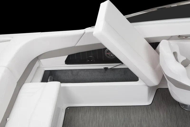 Slide: The Image of Manufacturer Provided Image: 2018 Four Winns H260 boat interior storage compartment with white cushioned seating. - 10