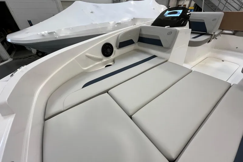 Slide: The Image of 2026 Hurricane SunDeck Sport 185 OB boat interior with cushioned seating and modern design. - 20