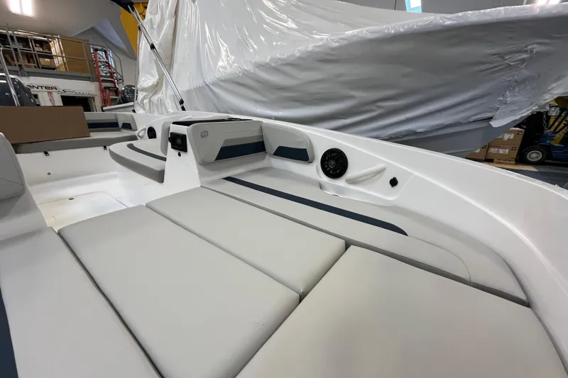 Slide: The Image of 2026 Hurricane SunDeck Sport 185 OB interior with cushioned seating and sleek design. - 21