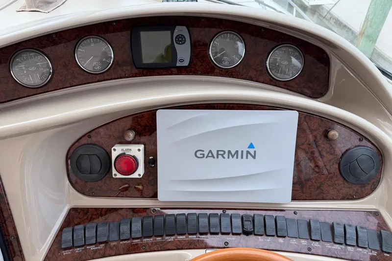 Slide: The Image of Dashboard of 2004 Sea Ray 480 Sedan Bridge with Garmin navigation system. - 5