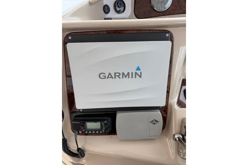 Slide: The Image of 2004 Sea Ray 480 Sedan Bridge dashboard with Garmin navigation system. - 6