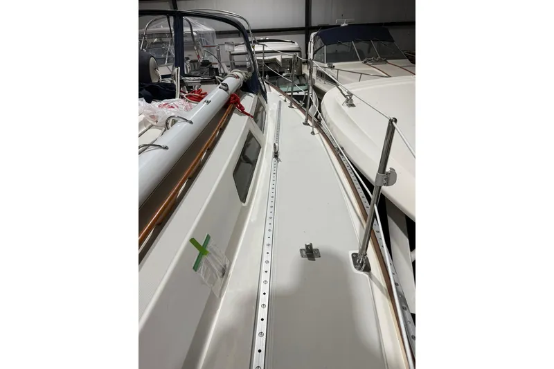 Slide: The Image of 1986 Sabre 34 MK II sailboat deck view in storage facility. - 17