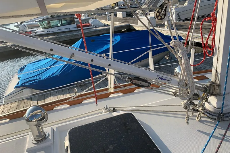 Slide: The Image of 1986 Sabre 34 MK II sailboat deck with rigging at marina. - 18