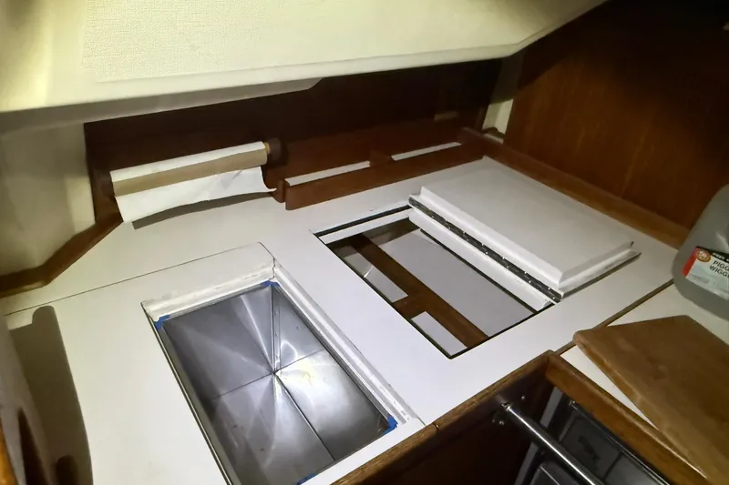 Slide: The Image of 1986 Sabre 34 MK II yacht galley with sink and countertop space. - 28