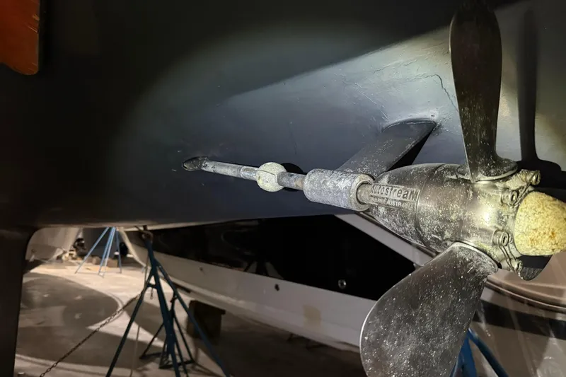 Slide: The Image of 1986 Sabre 34 MK II sailboat propeller and shaft in dry dock. - 60