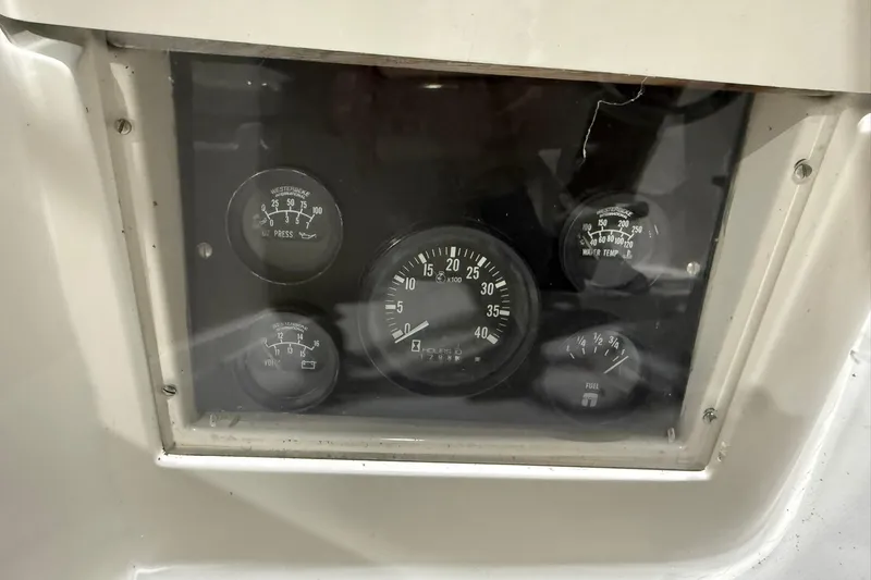 Slide: The Image of Instrument panel of a 1986 Sabre 34 MK II sailboat with gauges and dials. - 9