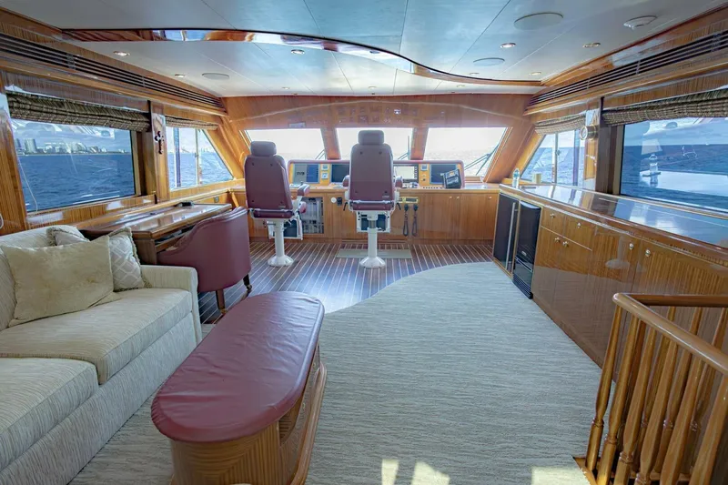 Slide: The Image of Luxurious 2009 Hargrave Enclosed Bridge yacht interior with wood paneling and modern cabinetry. - 23