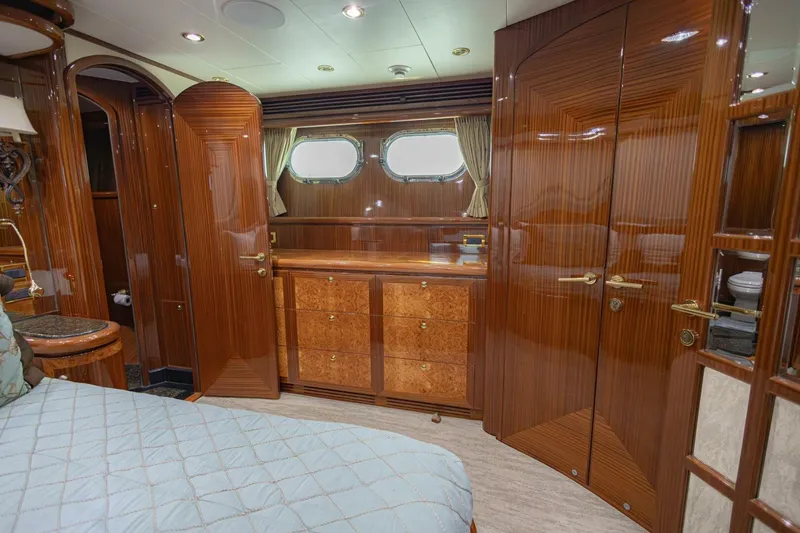 Slide: The Image of Luxurious interior of 2009 Hargrave Enclosed Bridge yacht with elegant wood finishes and plush seating. - 30