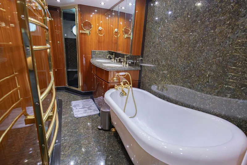 Slide: The Image of Luxurious bedroom interior of 2009 Hargrave Enclosed Bridge yacht with elegant wood finishes. - 31