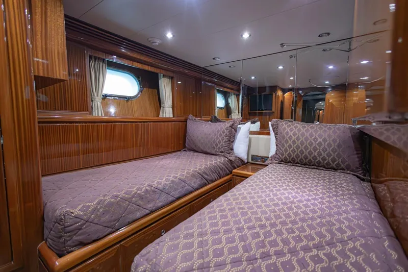 Slide: The Image of Luxurious bathroom in 2009 Hargrave Enclosed Bridge yacht with wood paneling and modern fixtures. - 44