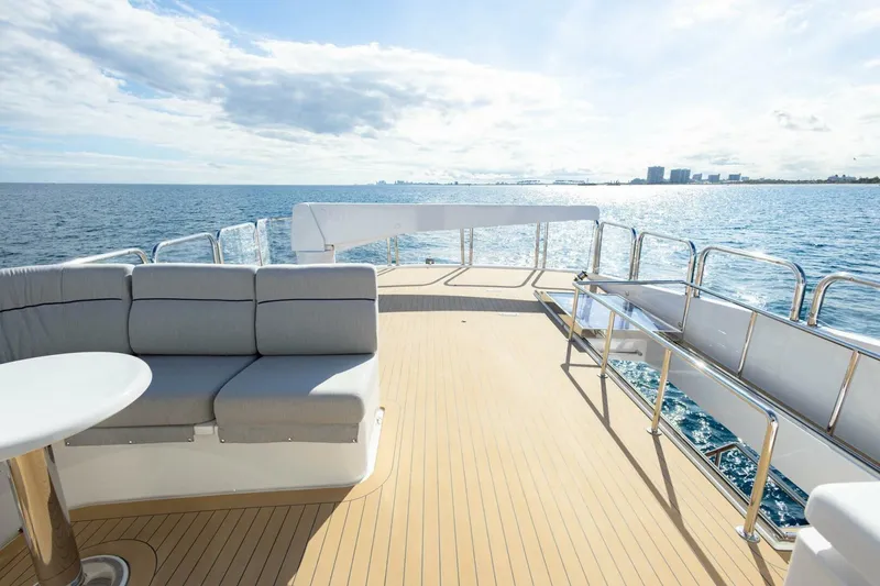 Slide: The Image of Luxurious 2009 Hargrave Enclosed Bridge yacht deck with ocean view and seating area. - 53