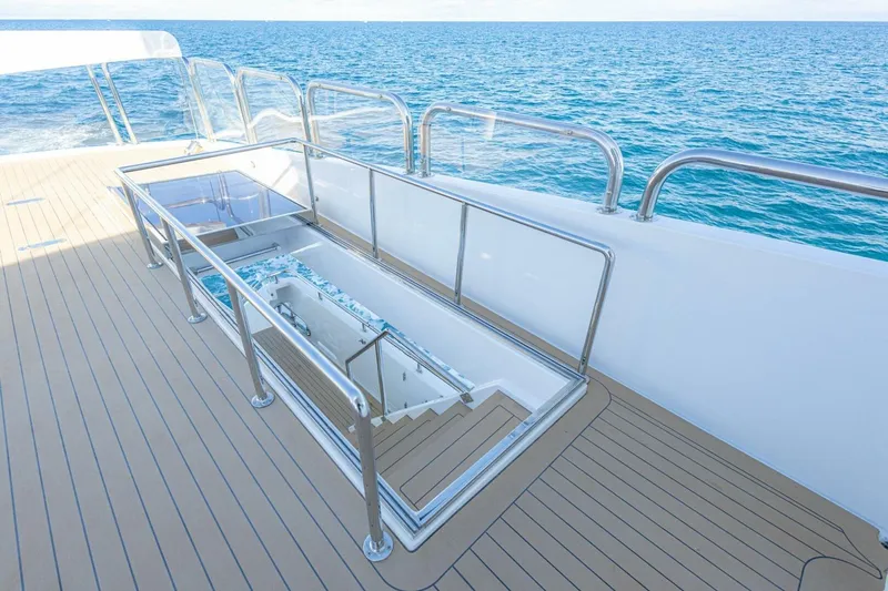 Slide: The Image of Luxurious 2009 Hargrave Enclosed Bridge yacht deck with ocean view and seating area. - 54