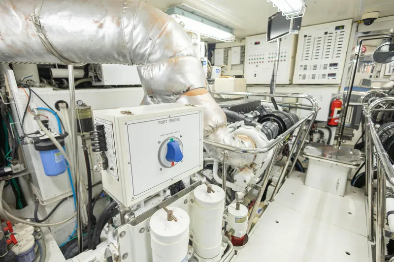 Slide: The Image of Luxurious cabin interior of 2009 Hargrave Enclosed Bridge yacht with wood paneling and TV. - 80