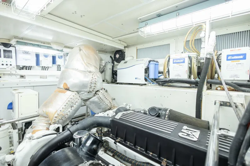 Slide: The Image of Engine room of 2009 Hargrave Enclosed Bridge yacht, featuring CAT machinery and equipment. - 88