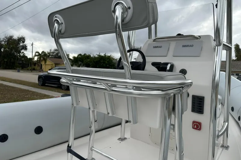 Slide: The Image of 2023 Ribcraft 5.85 boat console with Simrad electronics and stainless steel seating. - 8