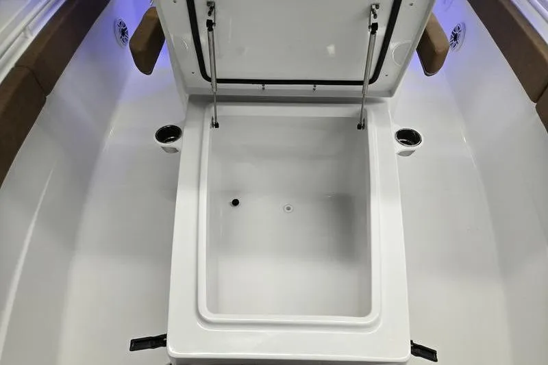 Slide: The Image of 2026 Sea Hunt Ultra 275 Coffin Box interior with open storage compartment. - 2