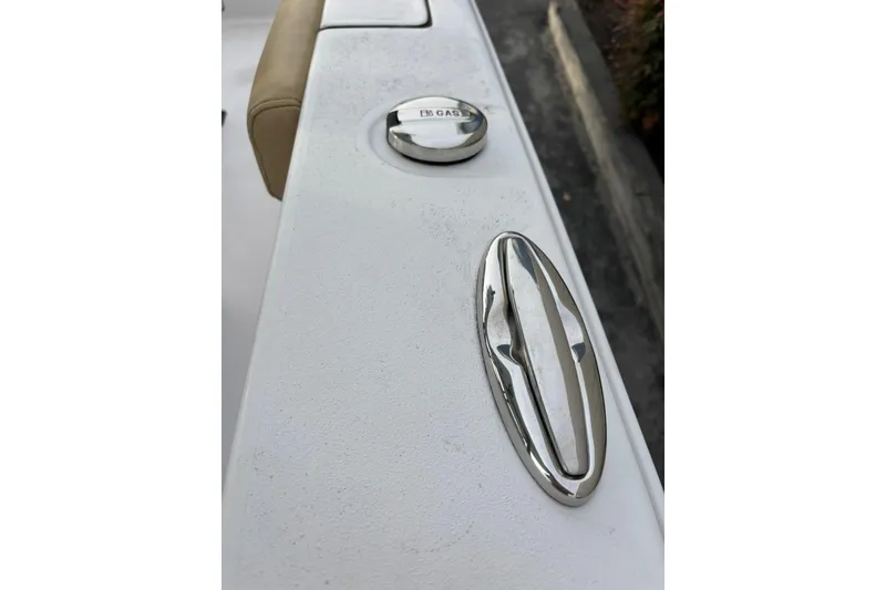Slide: The Image of 2021 Sportsman Heritage 231 Center Console boat deck with chrome fittings. - 10