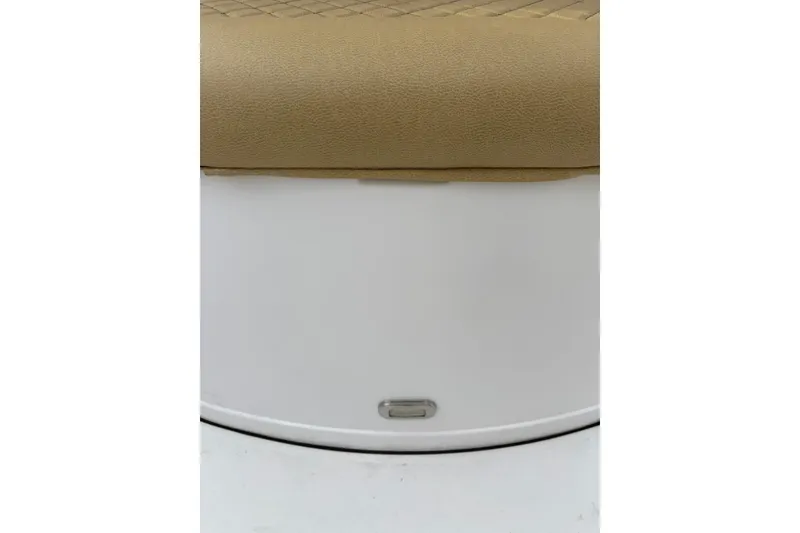 Slide: The Image of 2021 Sportsman Heritage 231 Center Console, tan cushioned seating detail. - 25