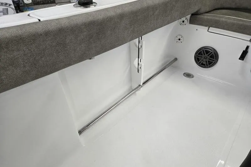 Slide: The Image of 2025 Sea Hunt Ultra 229 boat interior with seating and speaker detail. - 12