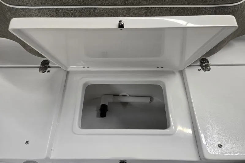 Slide: The Image of Open storage compartment on 2025 Sea Hunt Ultra 229 boat. - 19