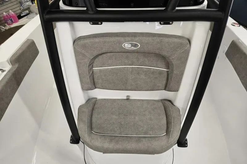 Slide: The Image of 2025 Sea Hunt Ultra 229 boat seat with gray upholstery and black frame. - 4