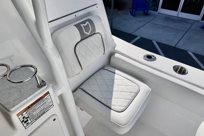 Slide: The Image of Luxurious seating on 2026 Sea Fox 248 Side Console boat, featuring diamond-stitched upholstery. - 10