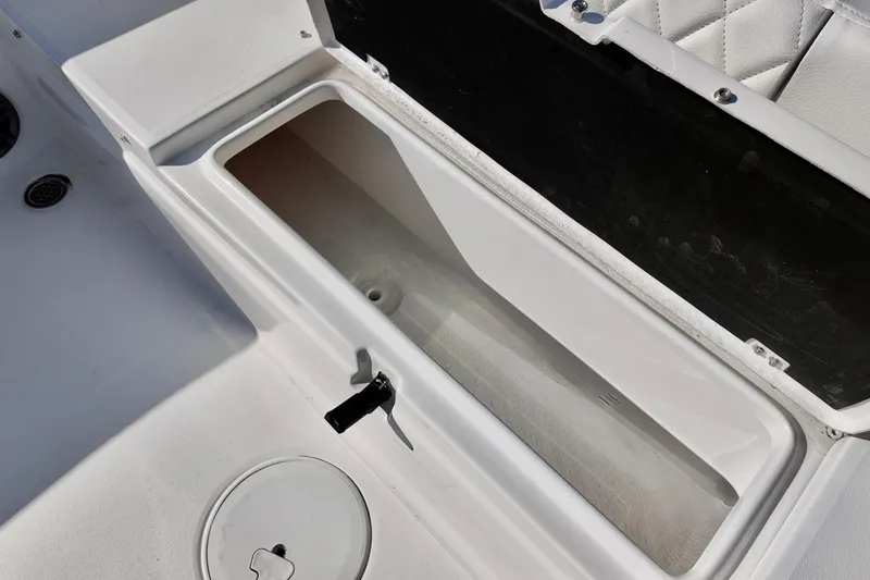 Slide: The Image of Open storage compartment on 2026 Sea Fox 248 Side Console boat. - 12
