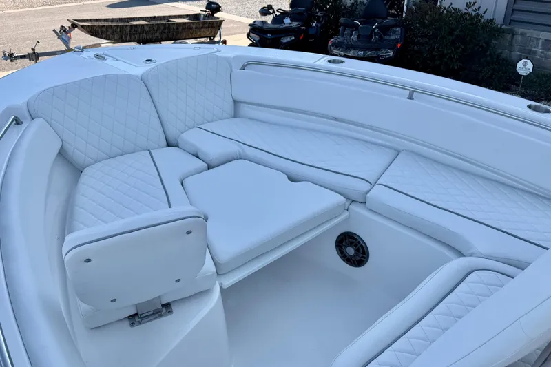 Slide: The Image of 2026 Sea Fox 248 Side Console boat with luxurious white seating and modern design. - 19