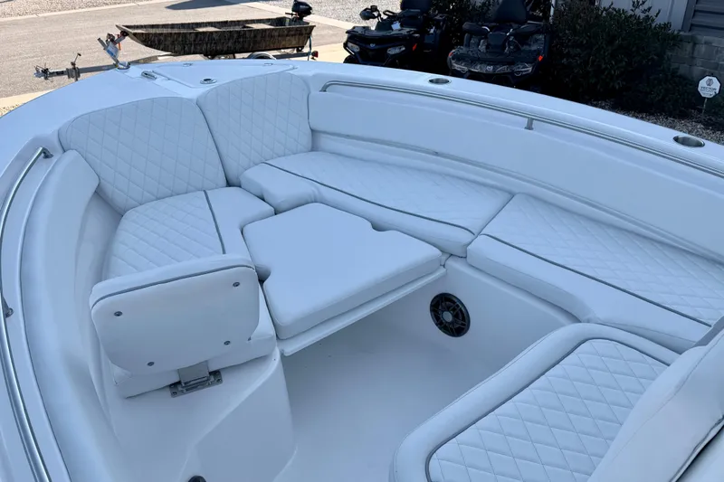 Slide: The Image of 2026 Sea Fox 248 Side Console boat with luxurious white seating and spacious layout. - 23