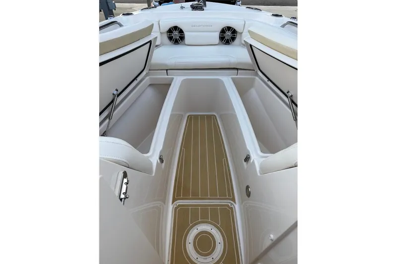 Slide: The Image of 2022 Grady-White Freedom 235 boat interior with seating and storage compartments. - 14
