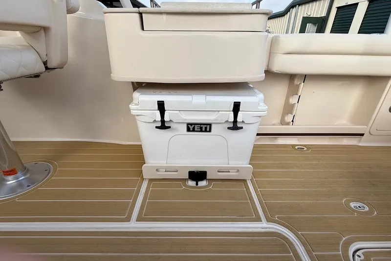 Slide: The Image of 2022 Grady-White Freedom 235 boat interior with Yeti cooler on deck. - 32