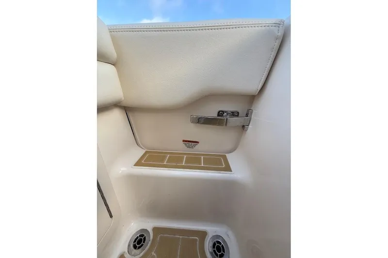 Slide: The Image of Interior detail of 2022 Grady-White Freedom 235 boat, featuring seating and hardware. - 39