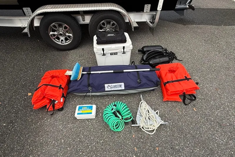 Slide: The Image of Boat accessories and safety gear for 2022 Grady-White Freedom 235, including life jackets and anchor. - 45