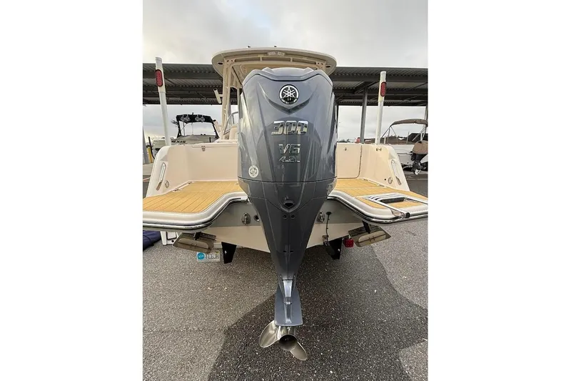 Slide: The Image of 2022 Grady-White Freedom 235 boat with Yamaha outboard motor, rear view. - 50