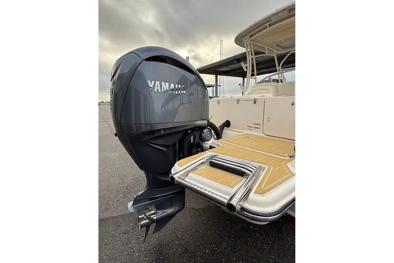 Slide: The Image of 2022 Grady-White Freedom 235 boat with Yamaha outboard motor, rear view. - 53