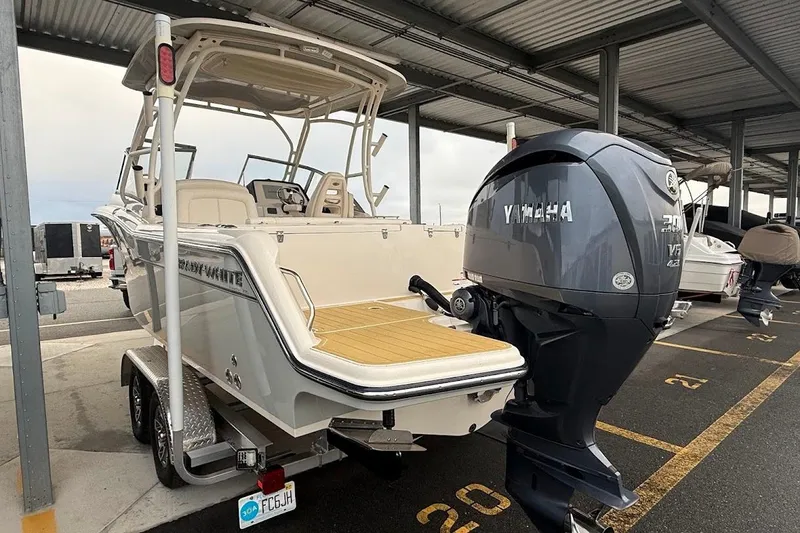 Slide: The Image of 2022 Grady-White Freedom 235 boat with Yamaha engine in covered parking. - 54