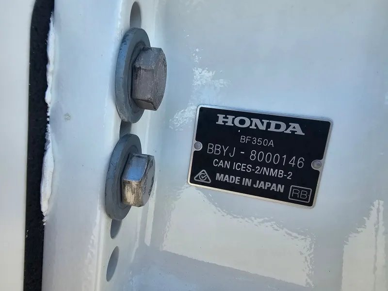 Slide: The Image of Honda BF350A plaque on Ocean Master 31, year 1987. - 12