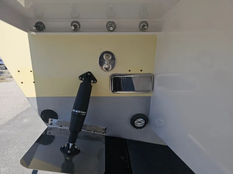 Slide: The Image of Rear view of a 1987 Ocean Master 31 boat. - 13