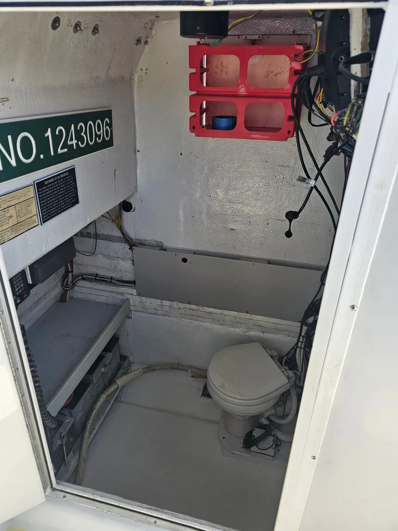 Slide: The Image of Interior of a 1987 Ocean Master 31 boat with toilet. - 23