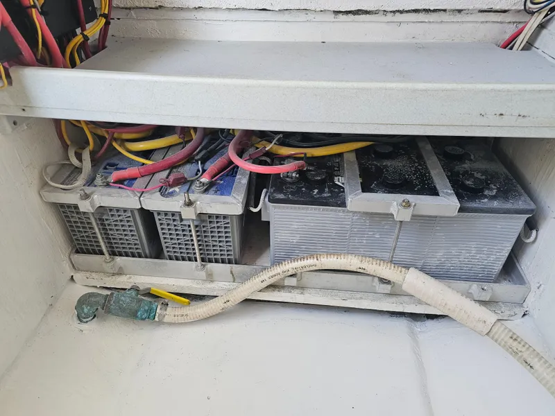 Slide: The Image of Batteries and cables in a 1987 Ocean Master 31 boat. - 27