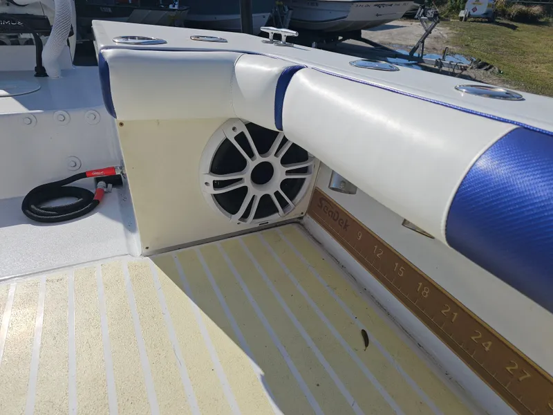 Slide: The Image of Interior of a 1987 Ocean Master 31 boat with speaker and SeaDek. - 49