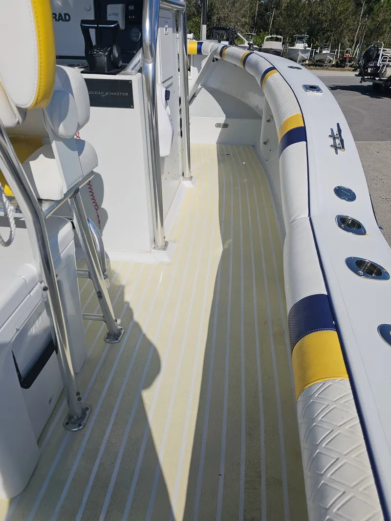Slide: The Image of 1987 Ocean Master 31 boat interior with yellow and blue accents. - 9